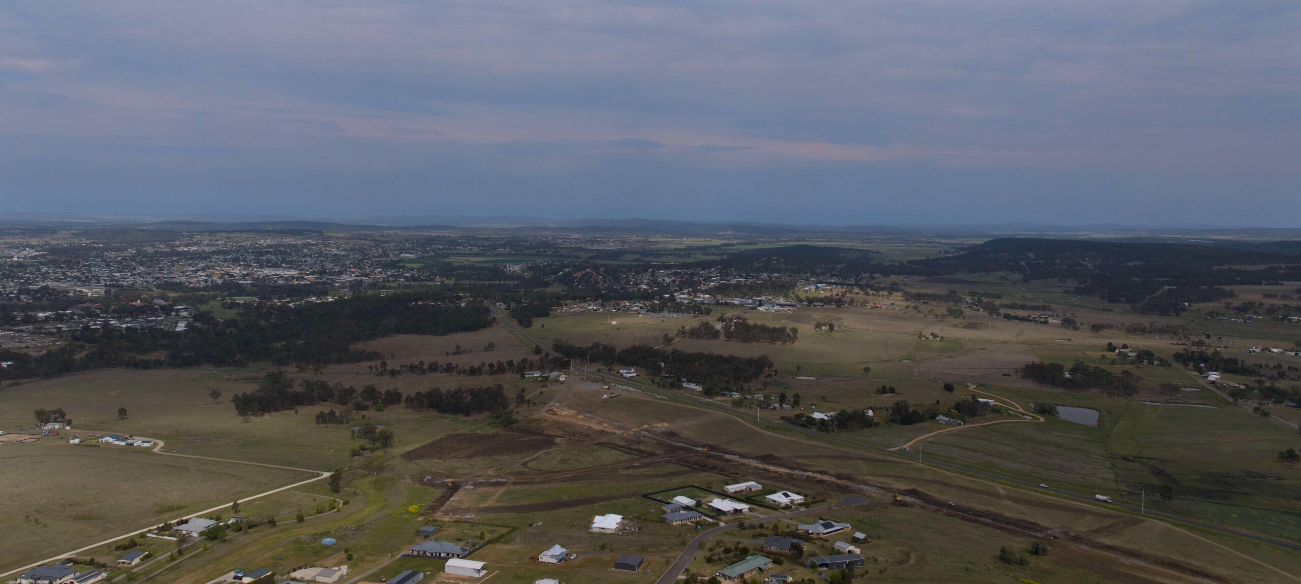 Sunset Park in the foreground. Warwick is minutes away.